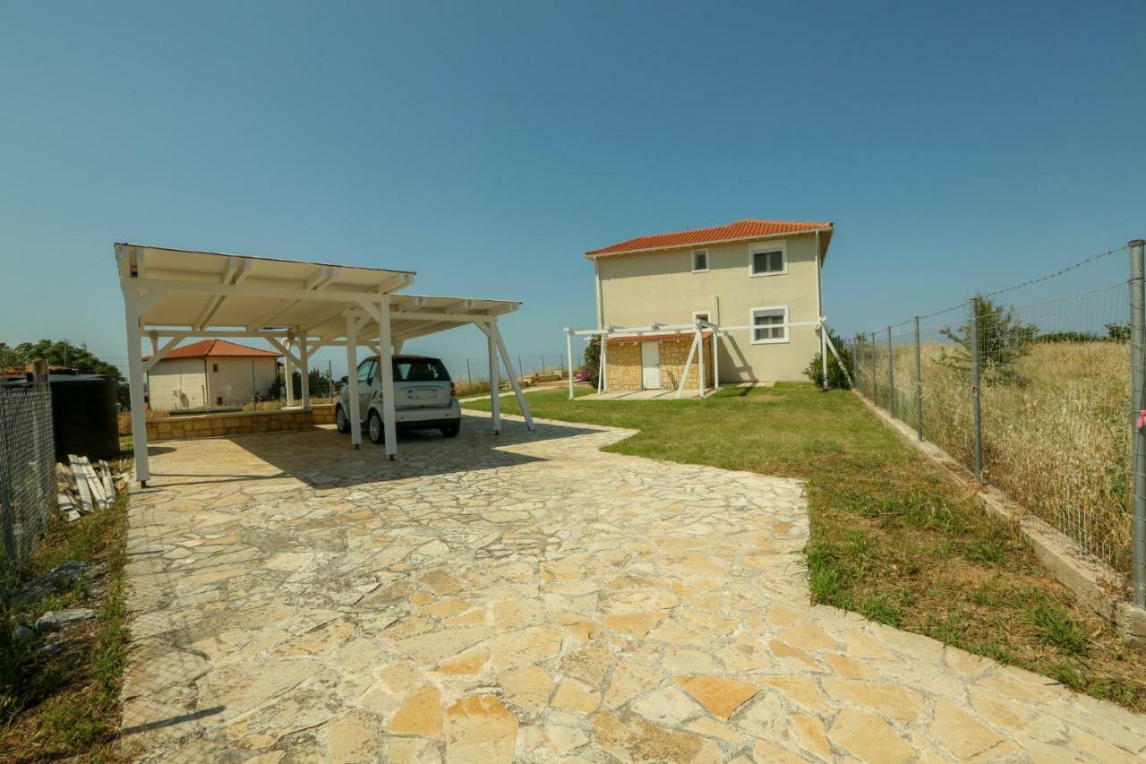Magnificent Seascape Villa On A Secluded Beach Неа Мудания Екстериор снимка